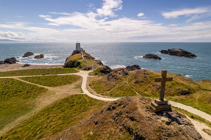 ynys llanddwyn cross and lighthouse