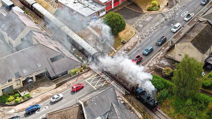 Steam train at Lydney Town crossing