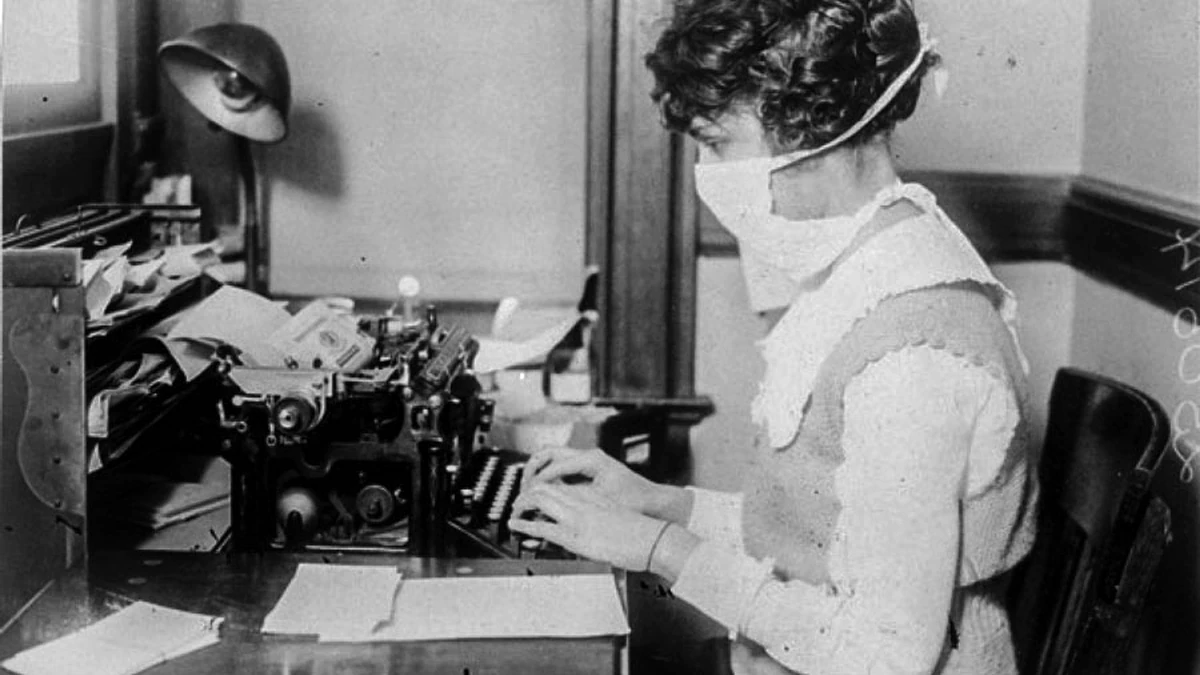 AC-MAIN-Influenza_Pandemic_Masked_Typist